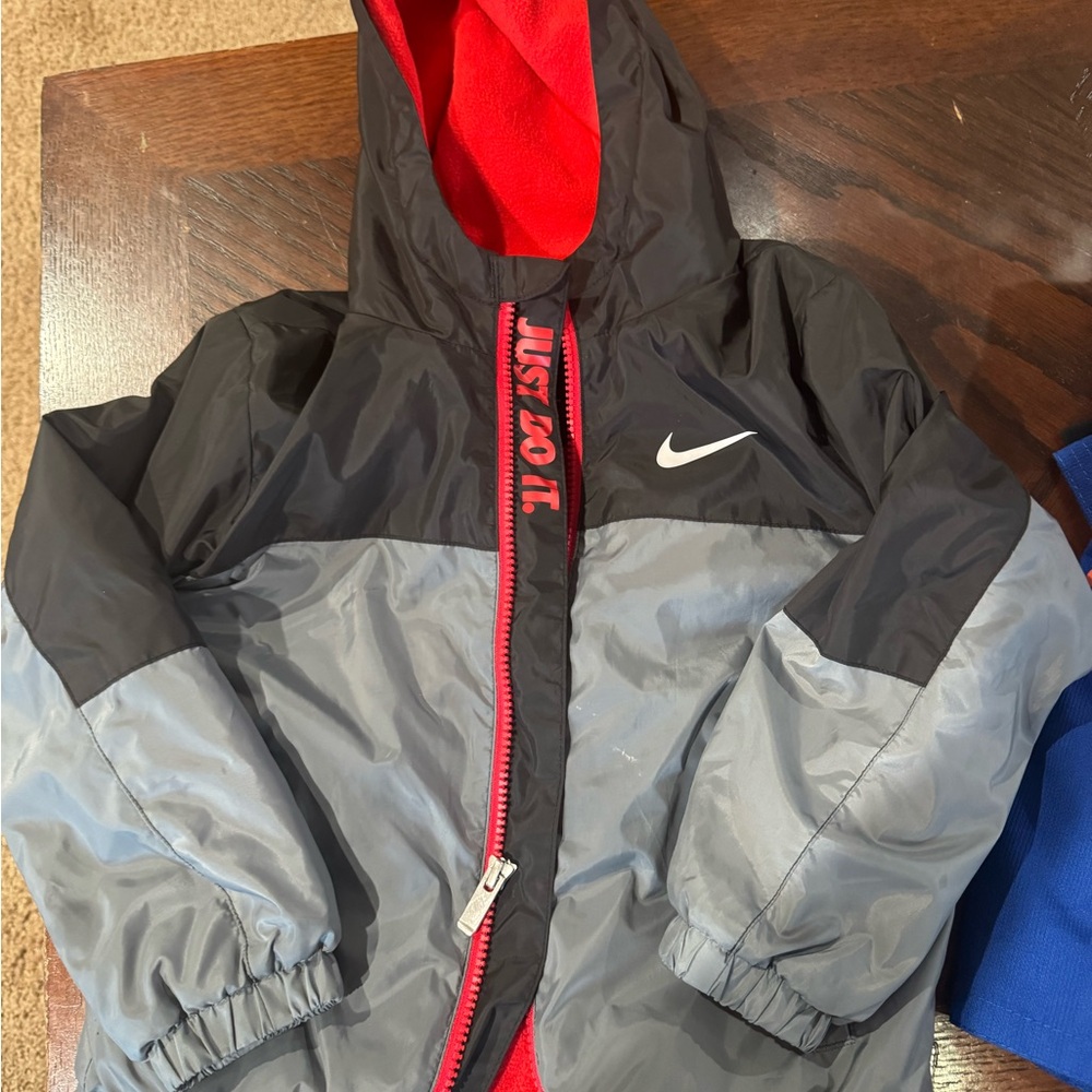 Nike Kids Raincoat in Black, Gray, and Red